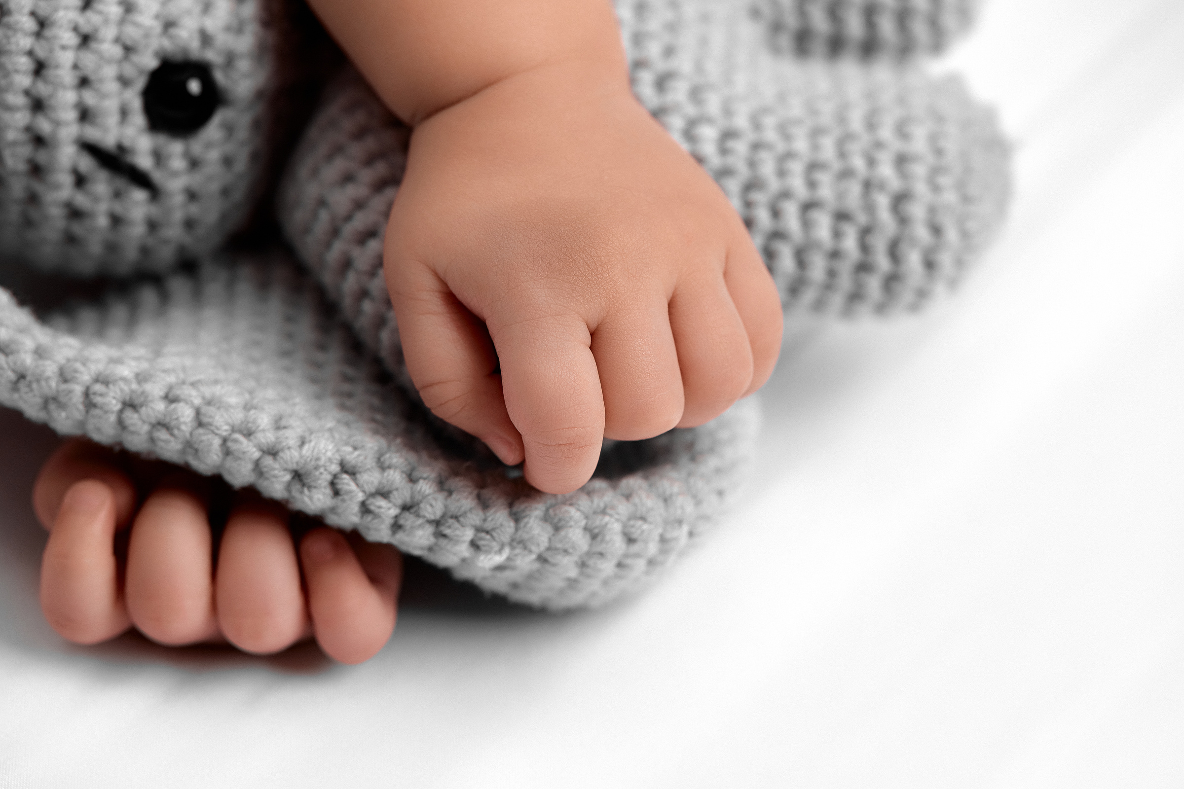 Closeup of Cute Baby Sleeping with a Plush